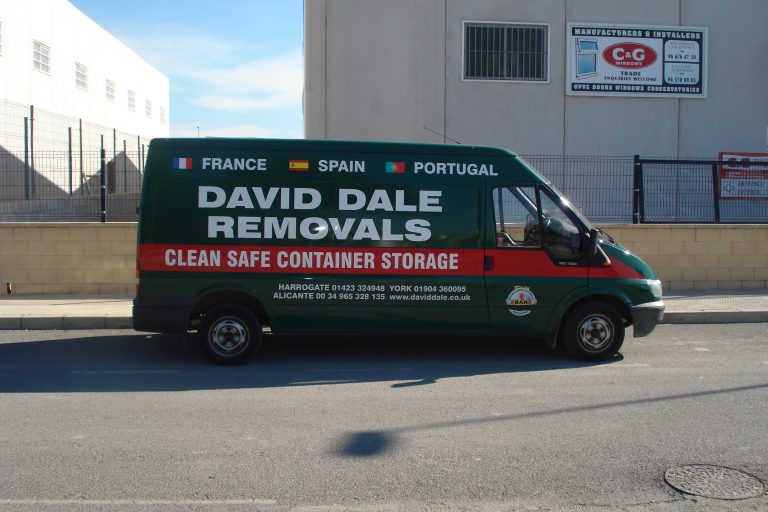 David Dale Removals crew using protective floor coverings during a house move on a Harrogate period property street