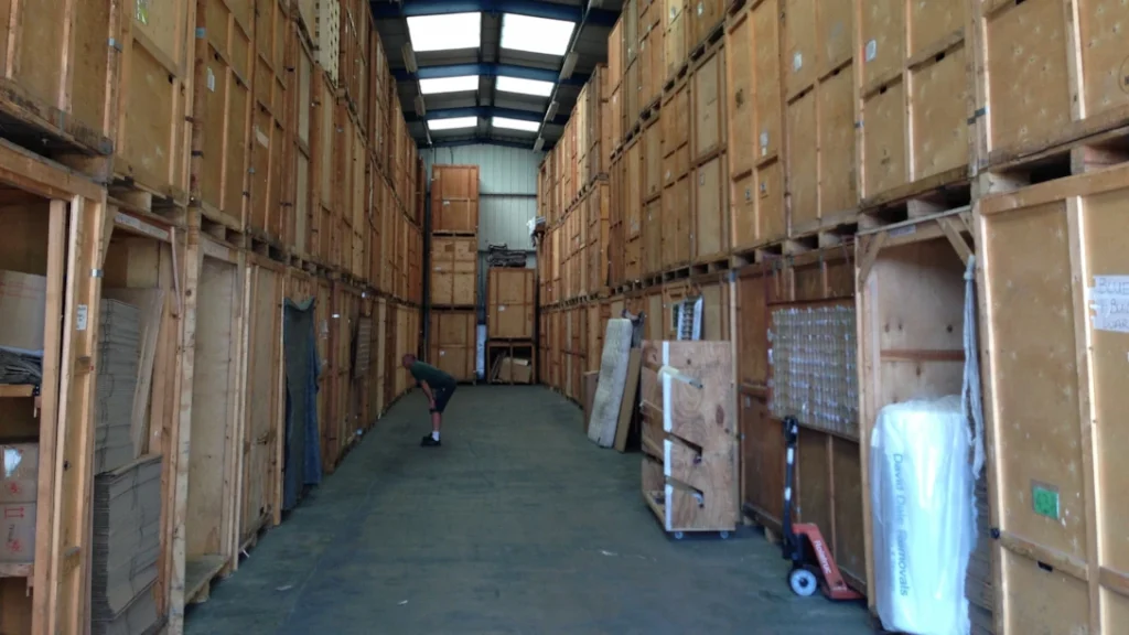Packing crates and export-grade boxes stacked ready for a UK to Portugal removal consignment